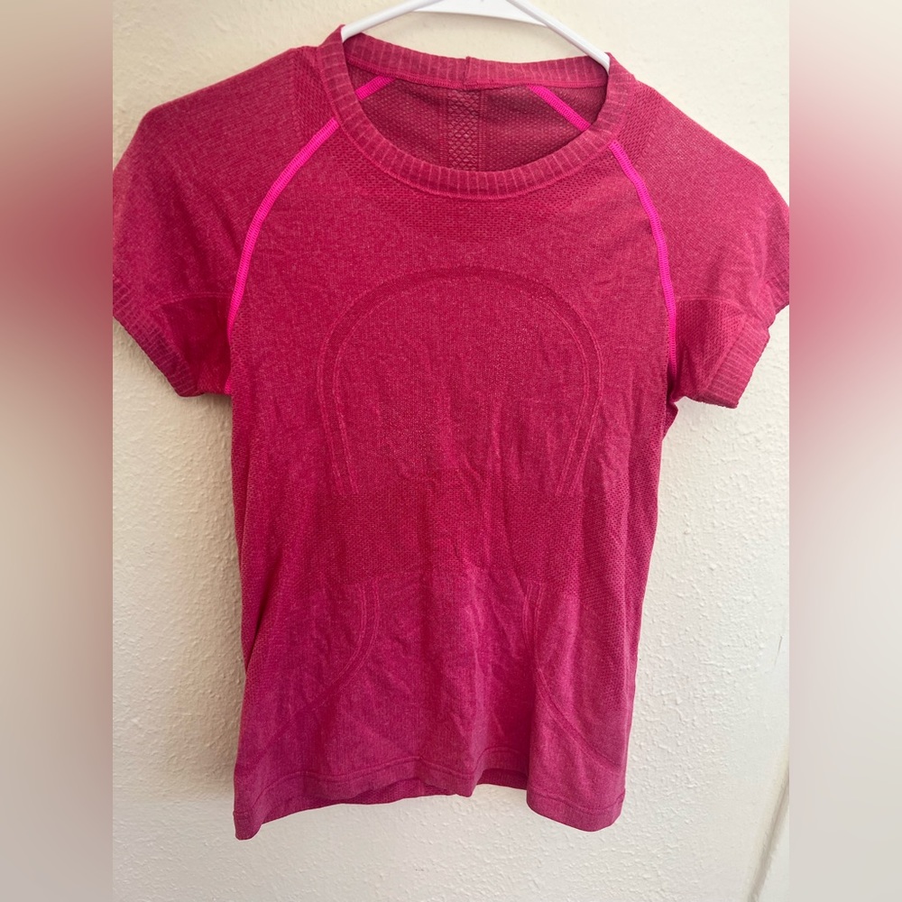 Well worn hot pink lululemon top